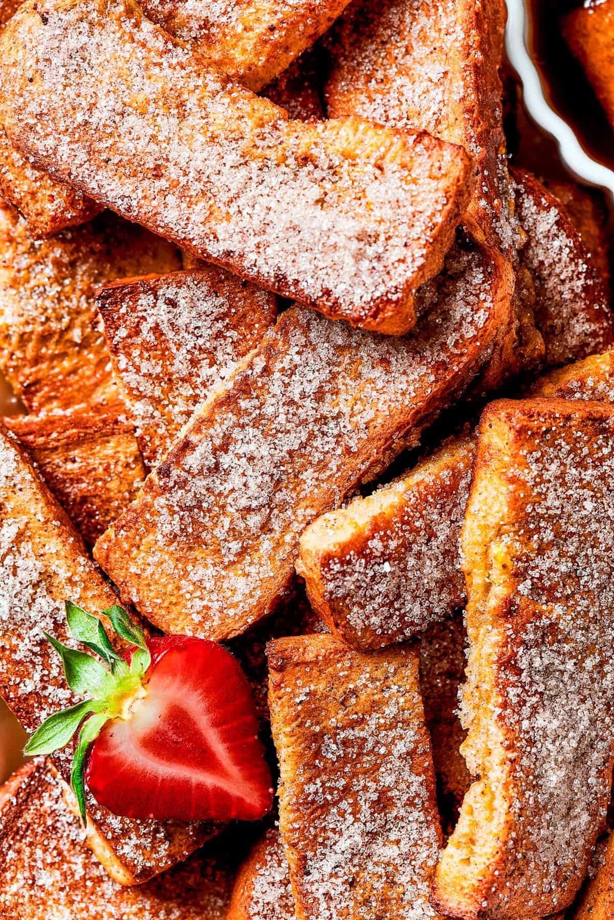 Close-up shot of cinnamon-sugar coated French toast.