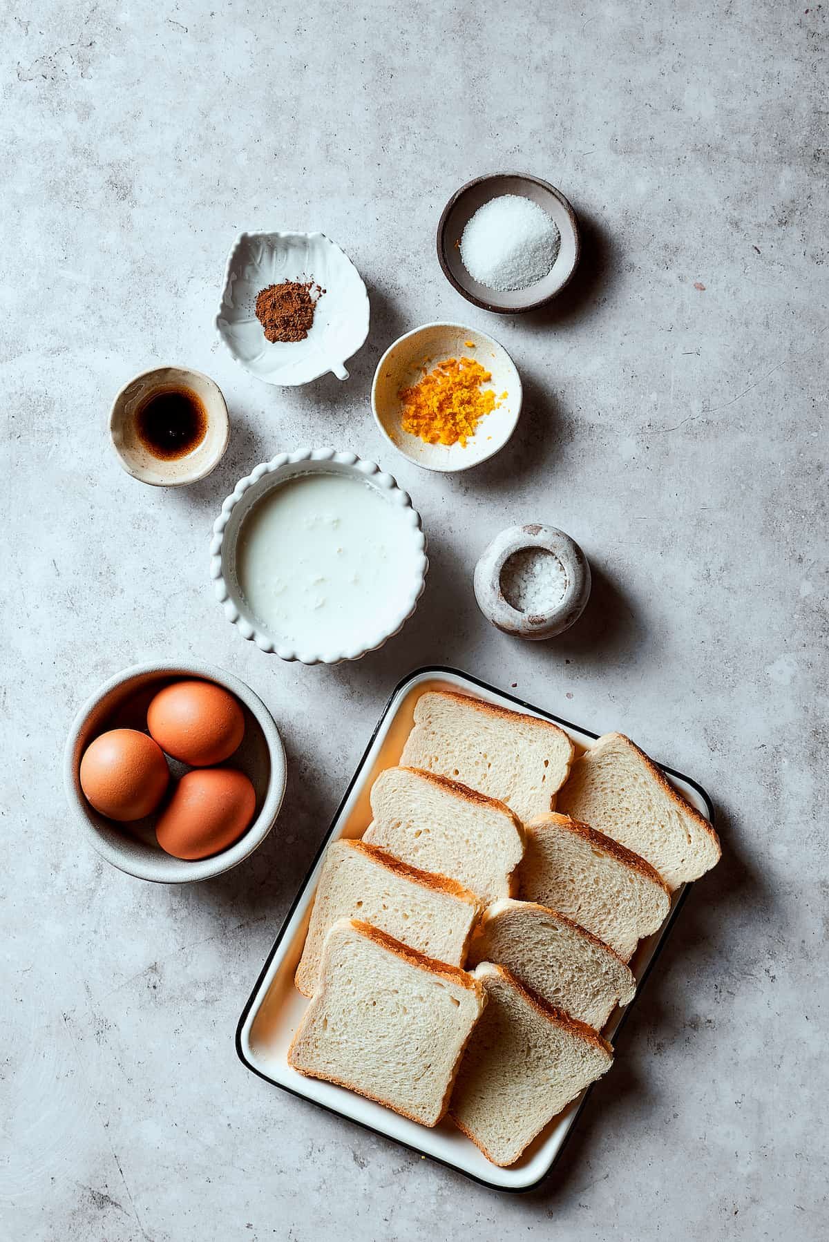 Cinnamon, sugar, orange zest, salt, brioche bread, eggs, heavy cream.