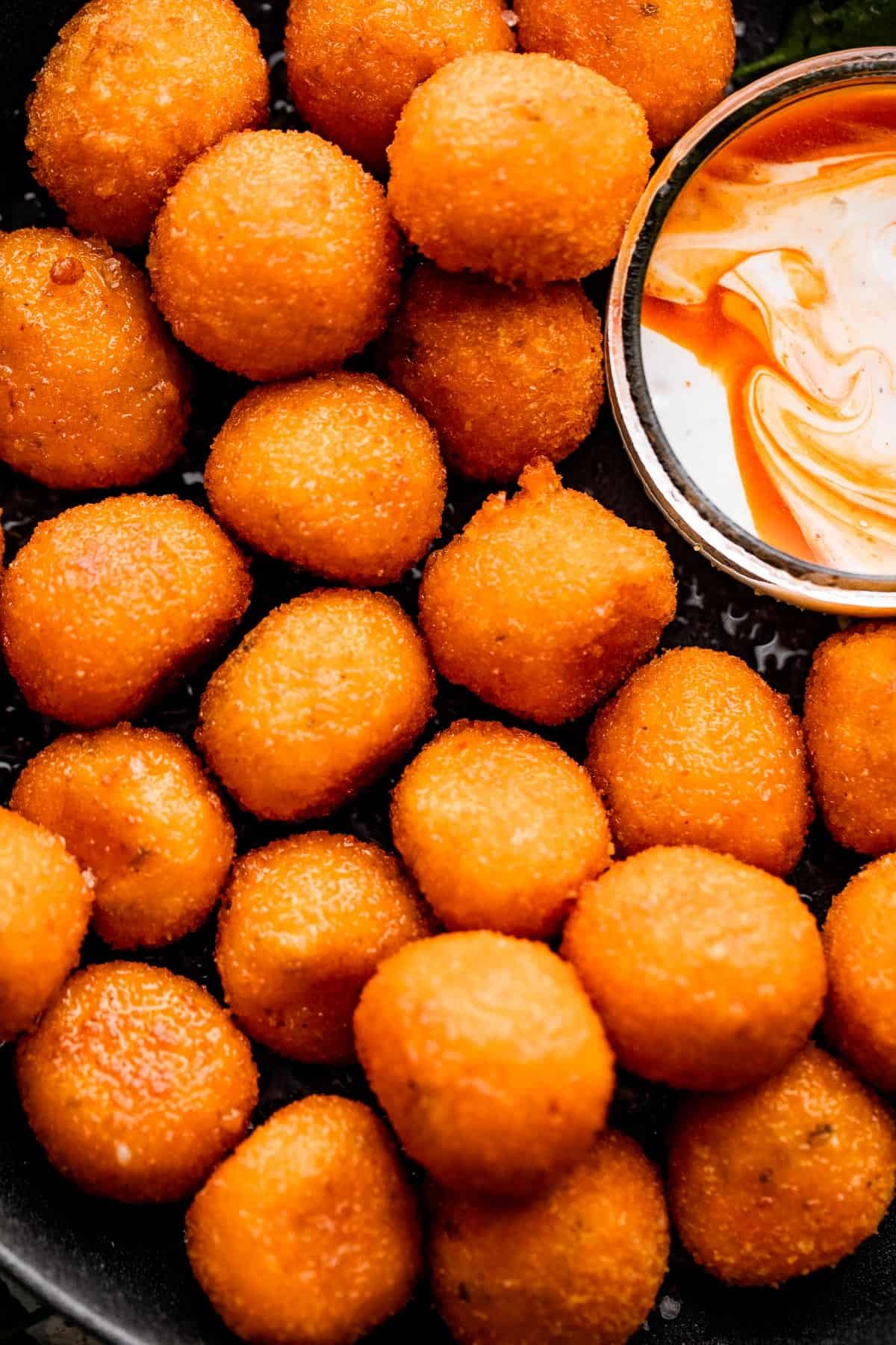 up close shot of air fryer cooked jalapeno popper balls