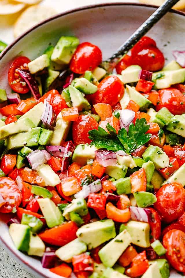 A bowl of avocado salsa.
