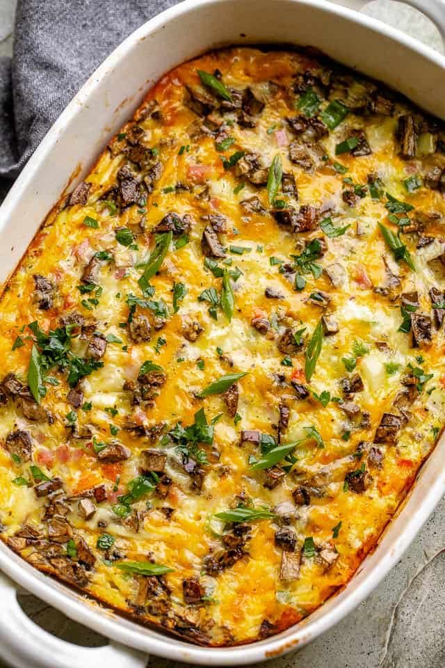 A baked Denver Omelet fresh out of the oven and in a the baking dish