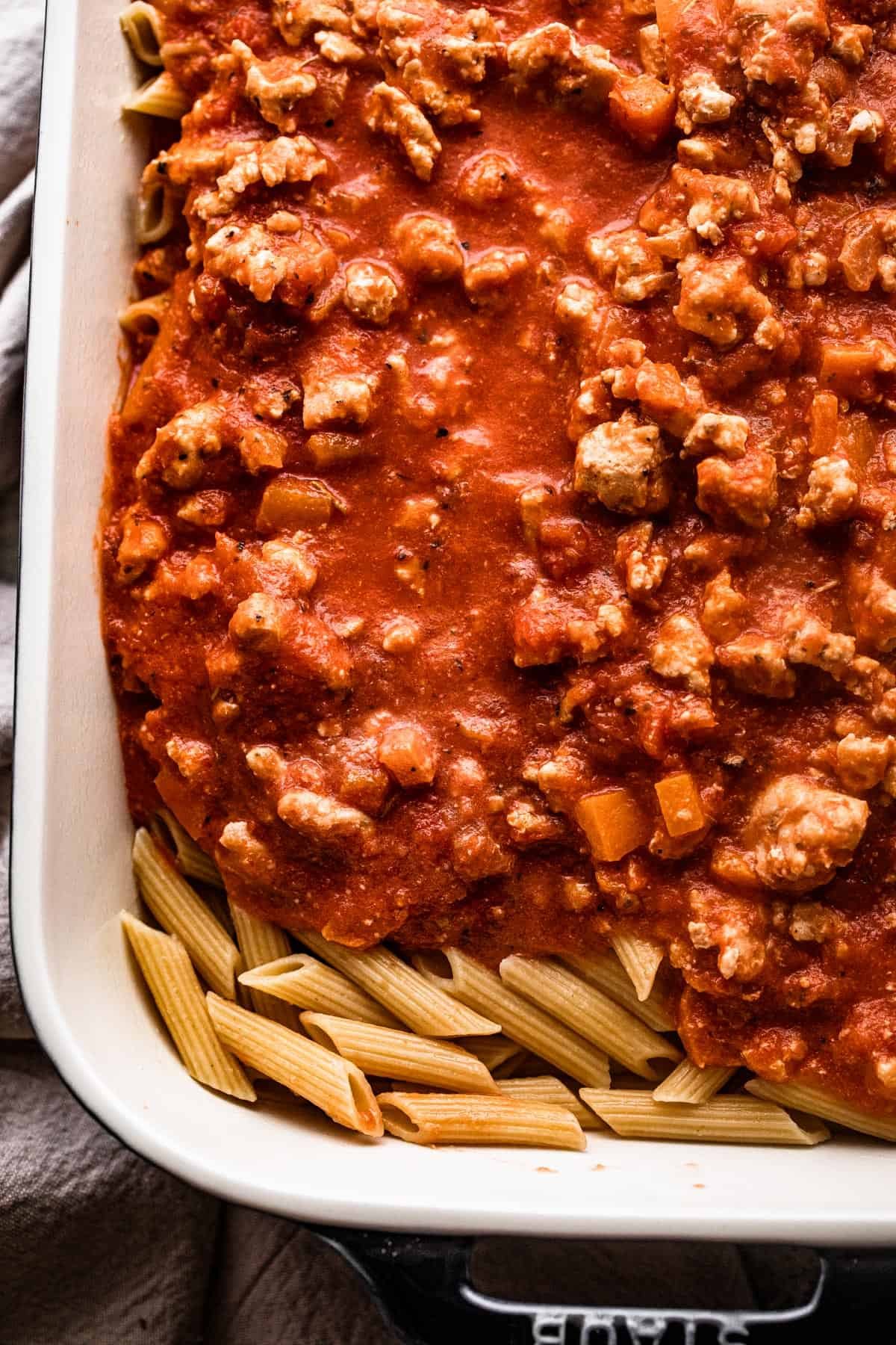 ground turkey tomato sauce poured over penne pasta.