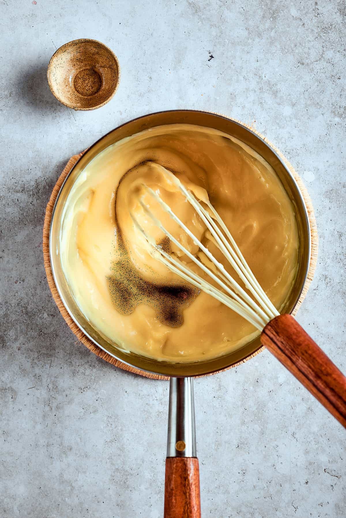 Thickened pudding in a saucepan.