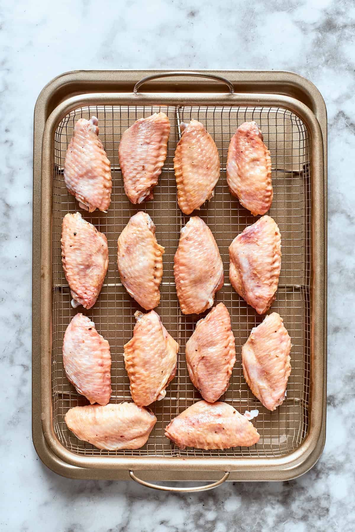 The wings are shown on a baking tray.