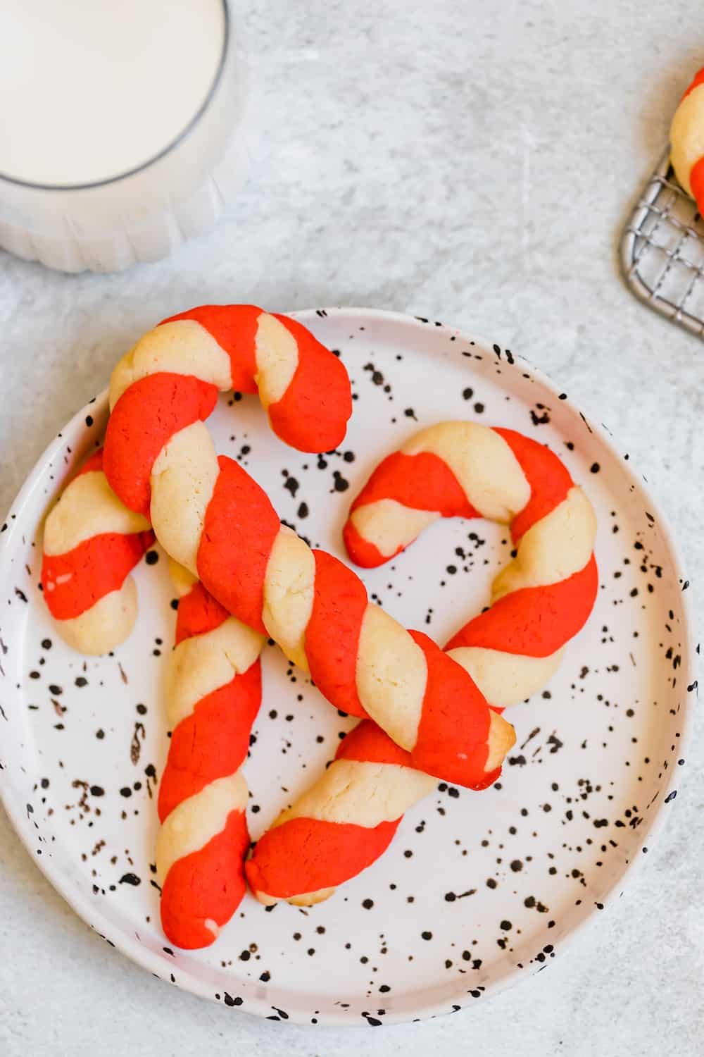 Three Candy Cane Sugar Cookies Seen From a Bird's Eye View