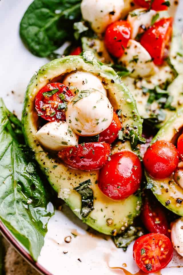 close up shot of Caprese Stuffed Avocados