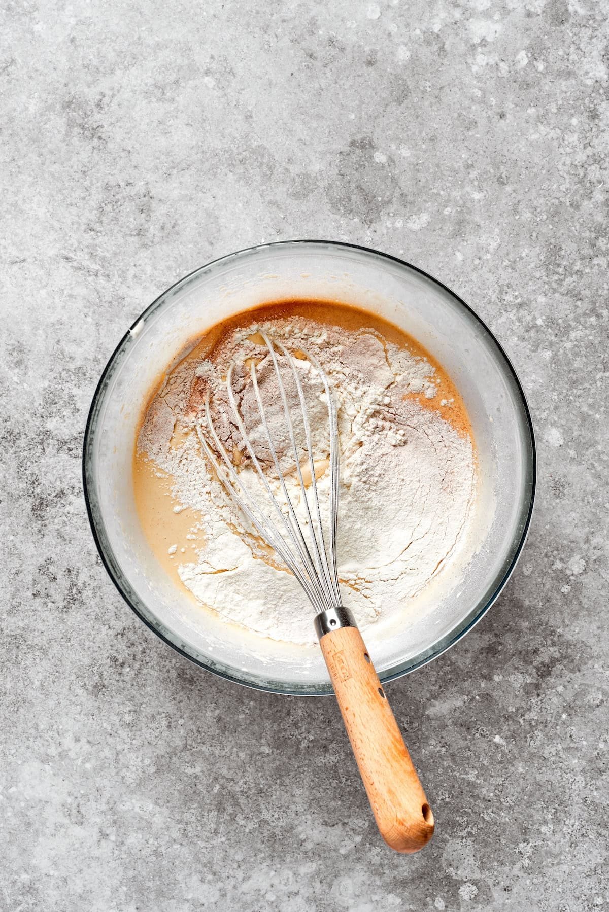 Dry mix is added to carrot cake batter.