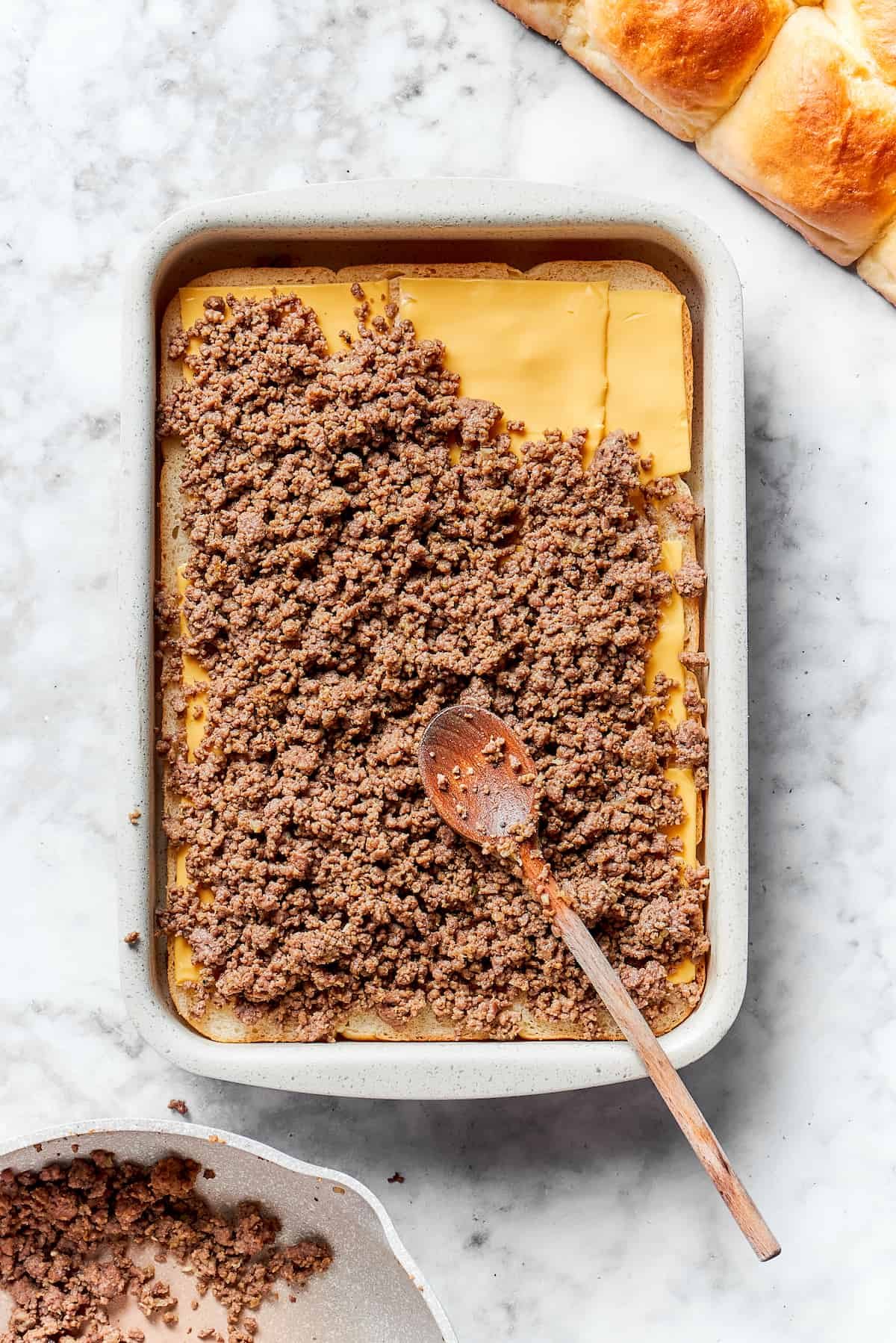 The beef mixture is added.