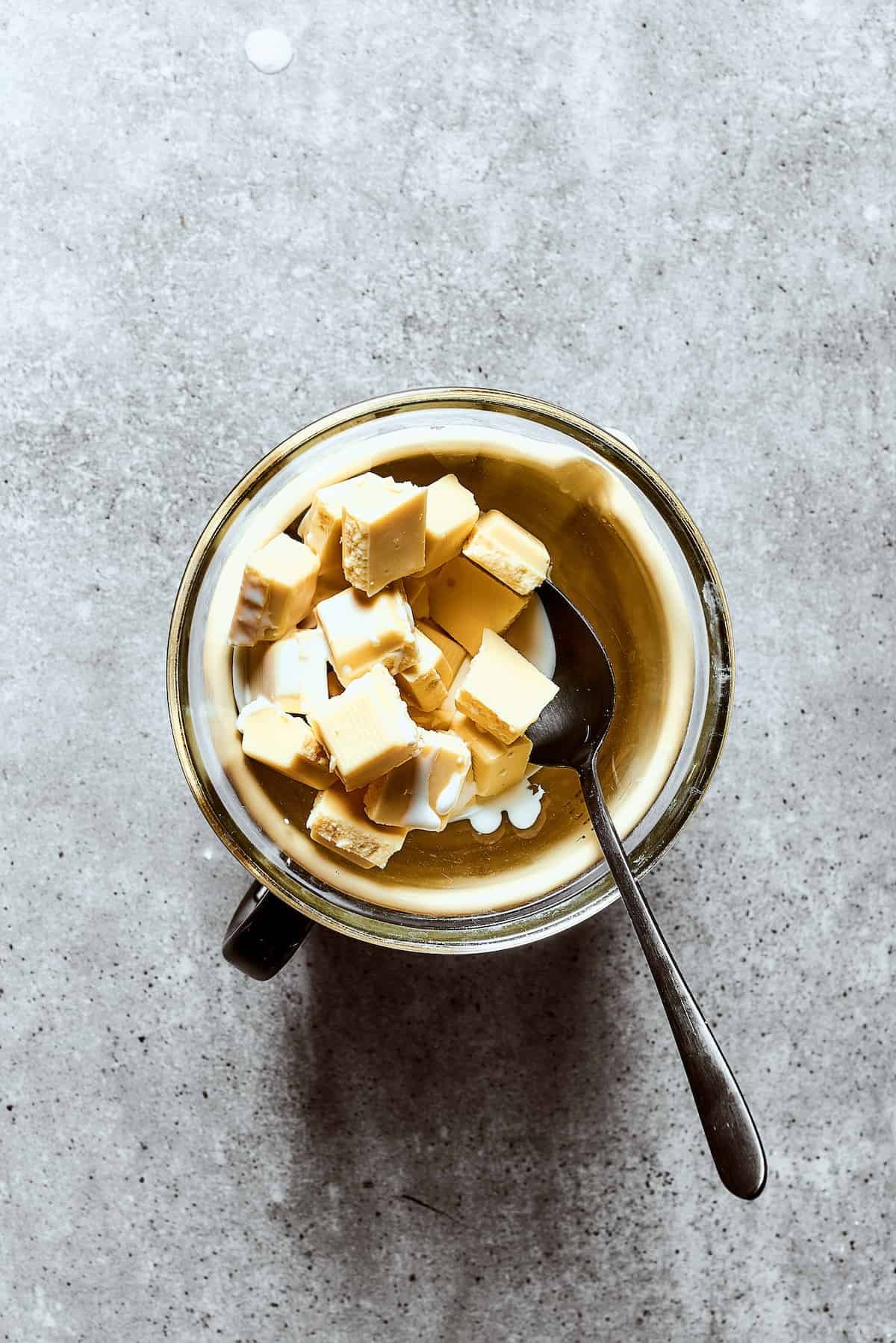 Melting white chocolate chunks for ganache.