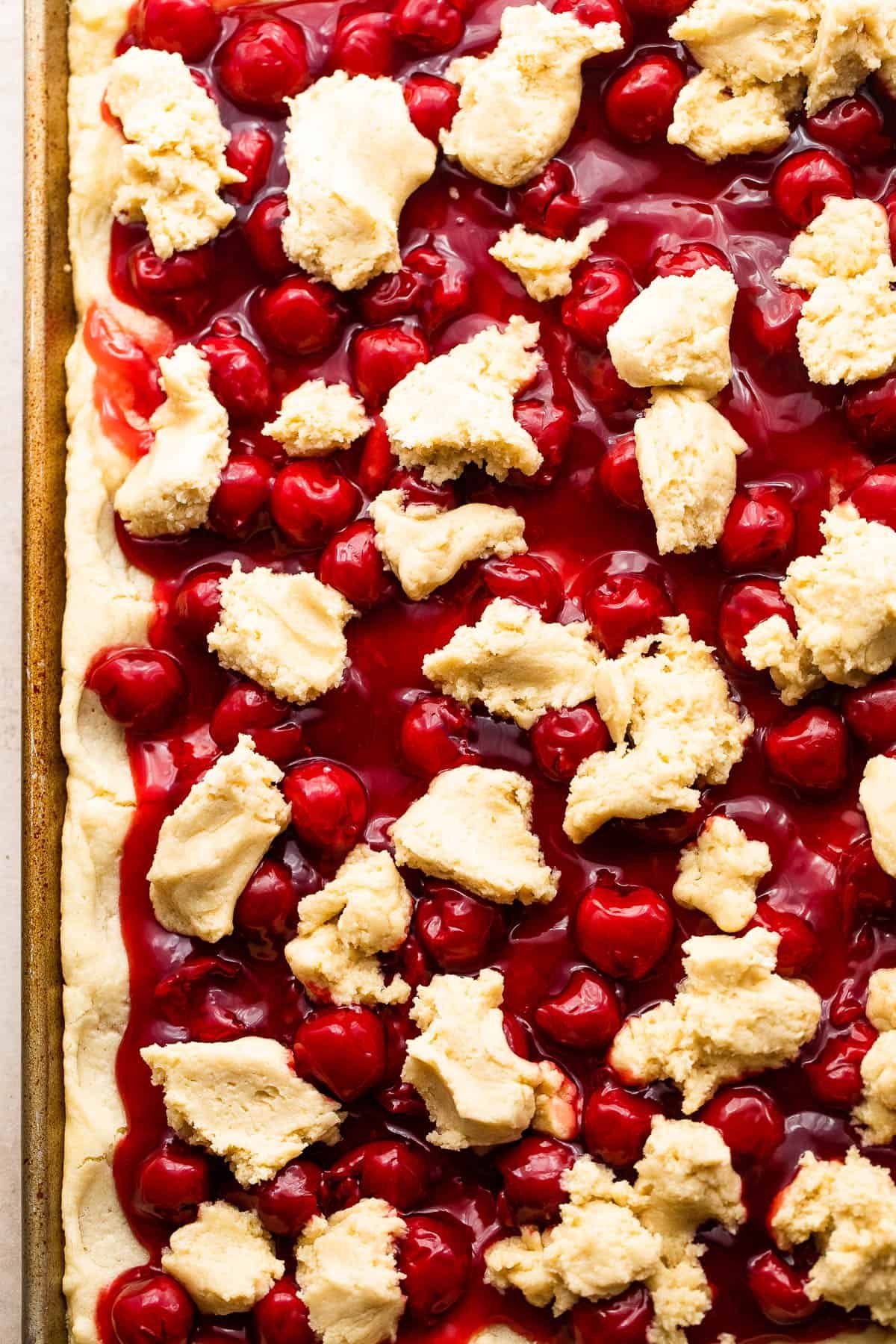 Scoops of Dough Overtop Cherry Pie