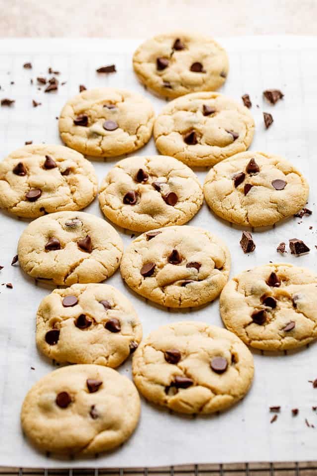 A cookie sheet with chocolate chip cookies.