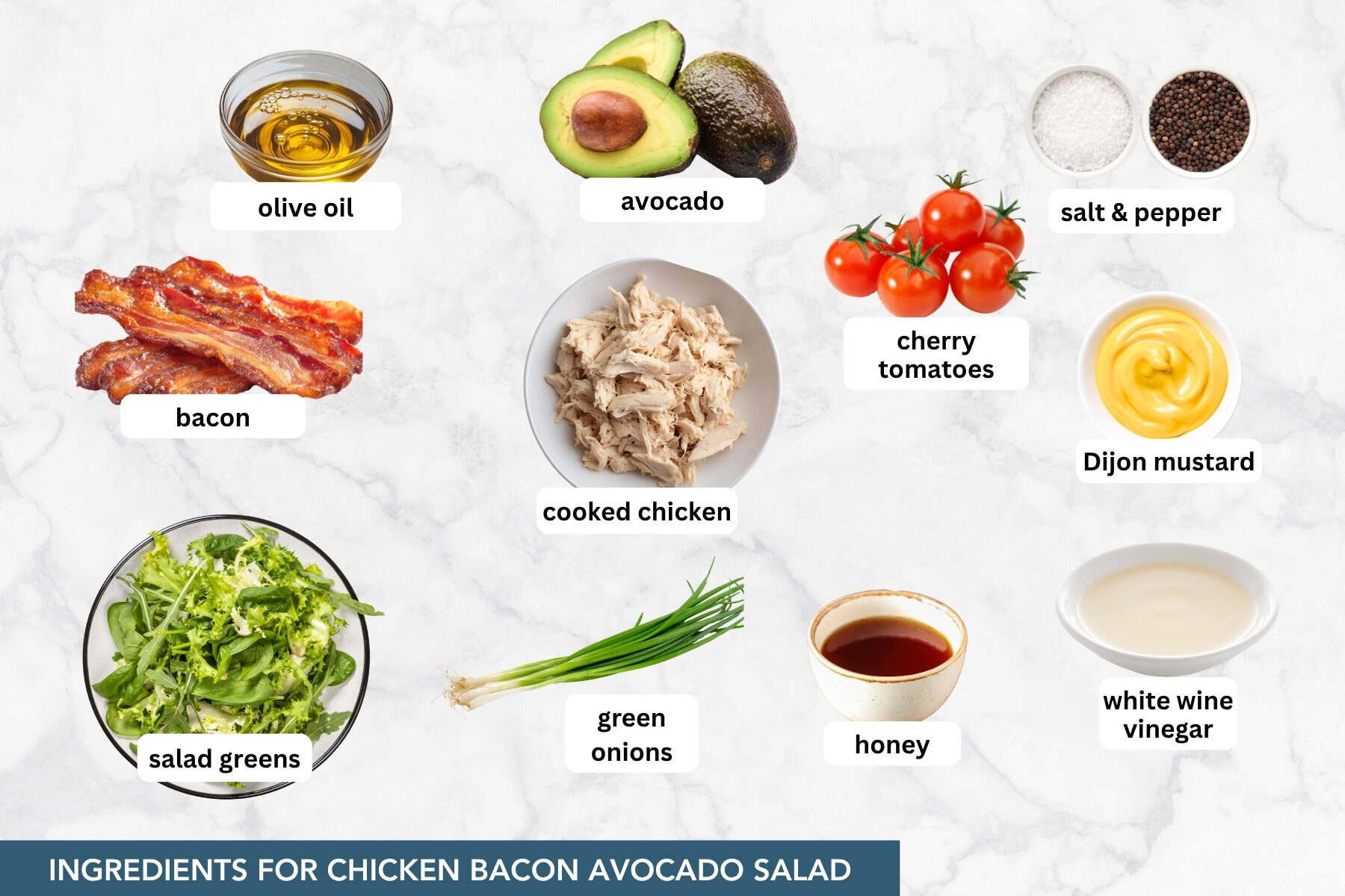 Ingredients for chicken bacon avocado salad, including cooked chicken, bacon, avocado, salad greens, cherry tomatoes, green onions, and honey mustard dressing ingredients.