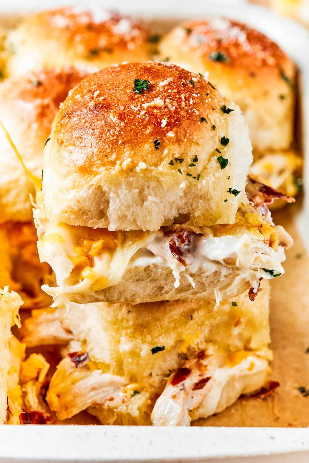 Two stacked sliders packed with chicken and bacon plus ranch.