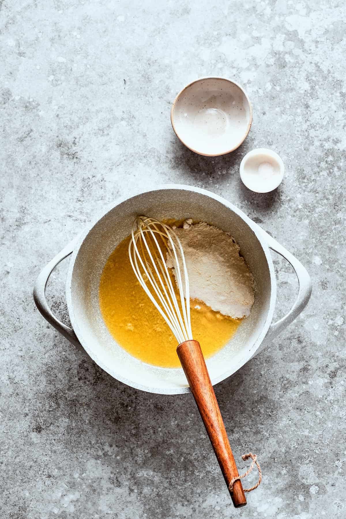 Flour is mixed into the roux.