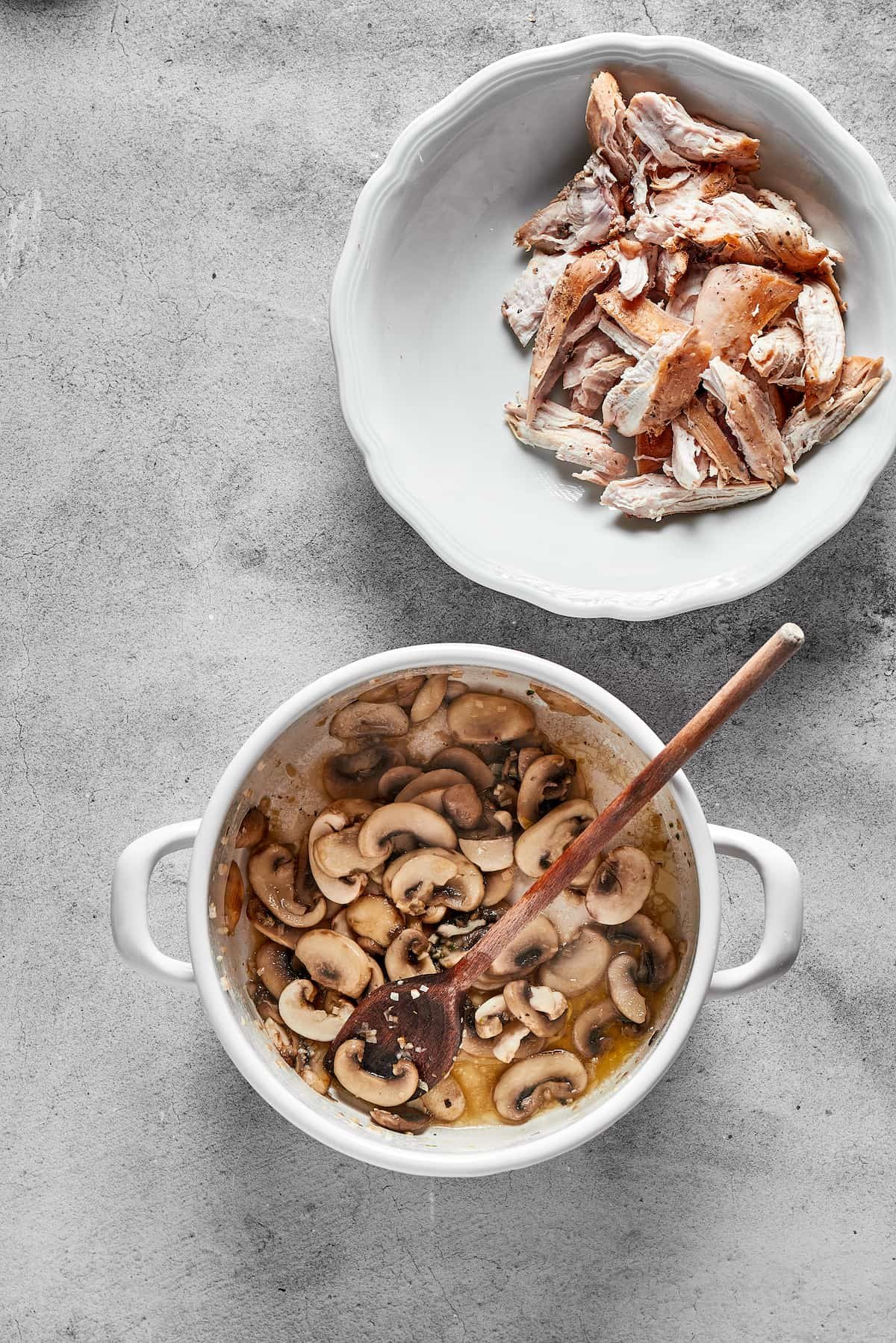 Cooking sliced mushrooms.