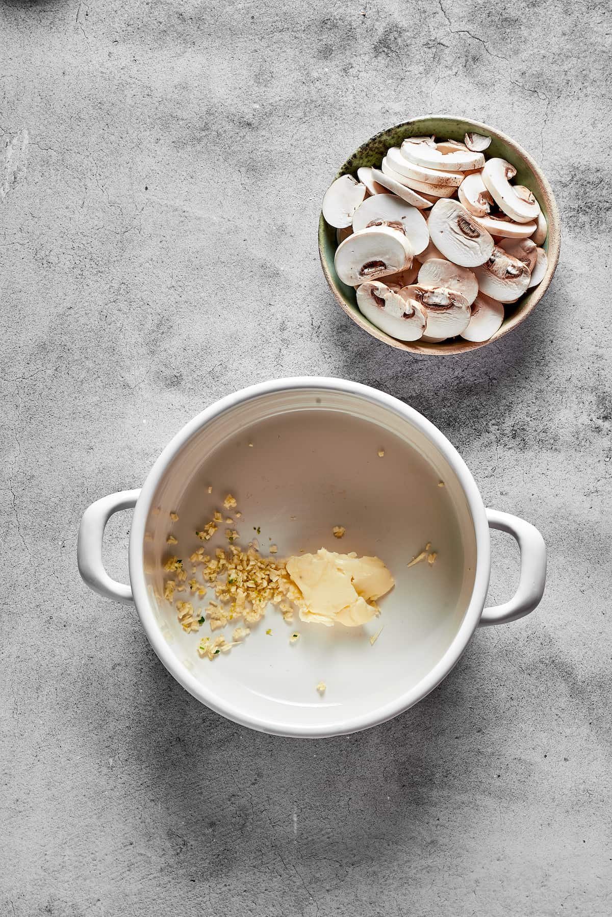 Butter and garlic in a soup pot.