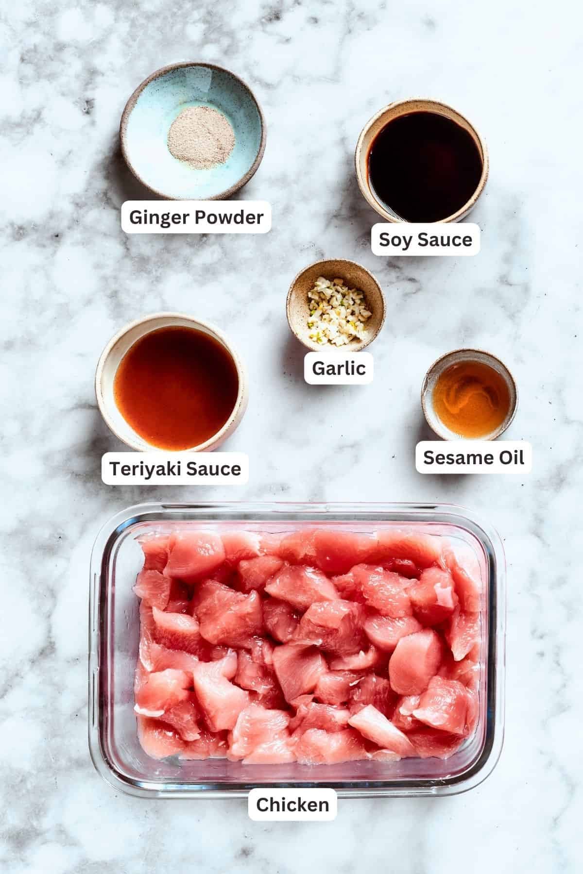 Chicken wonton tacos filling ingredients: teriyaki sauce, ginger powder, garlic, soy sauce, sesame oil, chicken.
