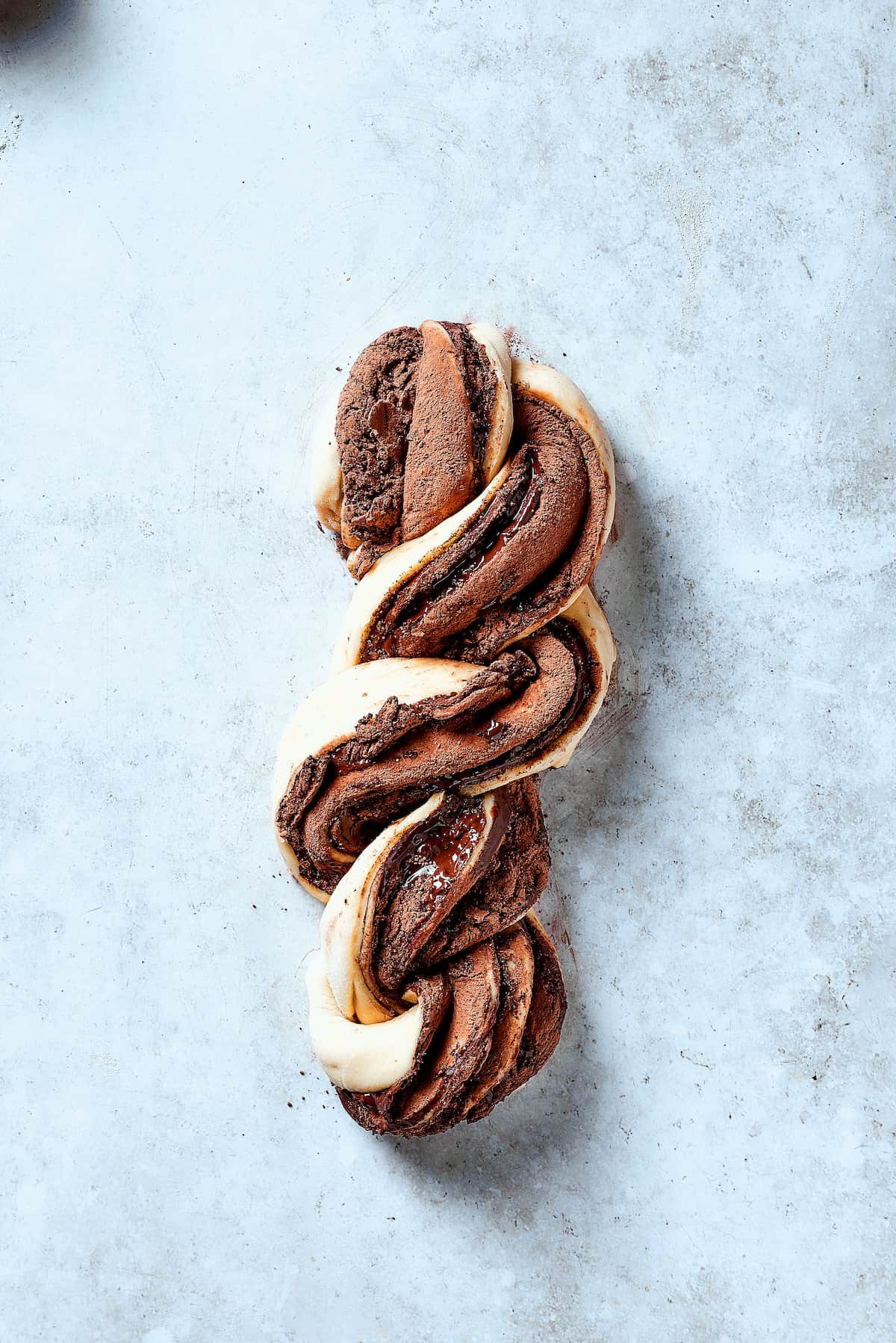 Layered, chocolate filled pieces of dough wrapped around each other.