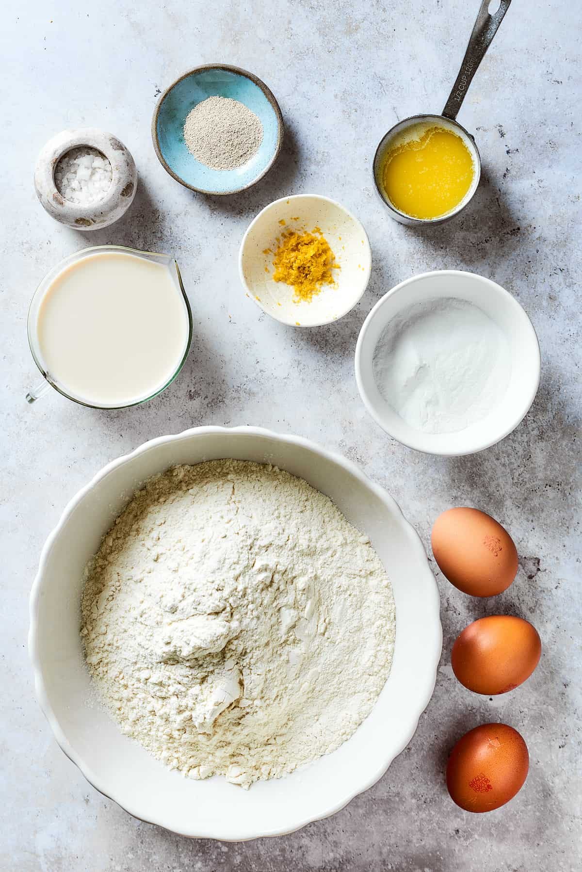 Baking ingredients measured and arranged on a work surface.