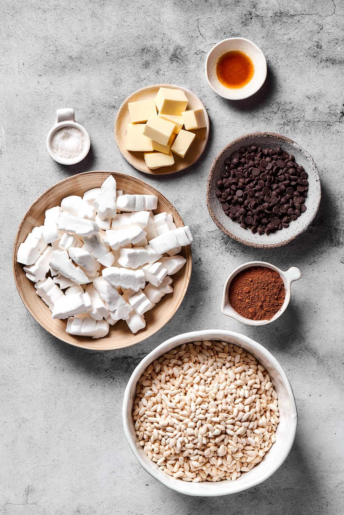 From top: Vanilla, chocolate chips, cocoa powder, crispy rice cereal, marshmallows, butter, flaky sea salt.
