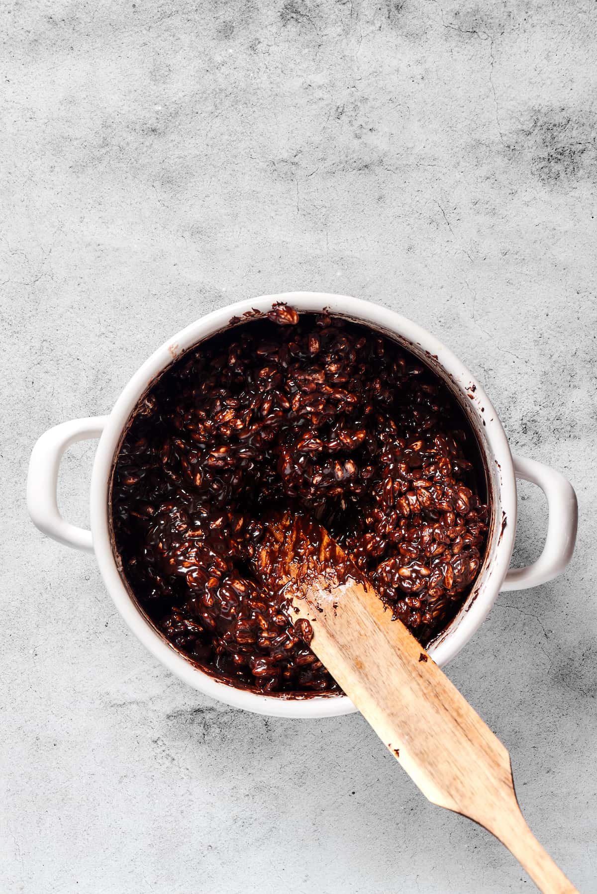 Chocolate rice cereal mixture in a pot.