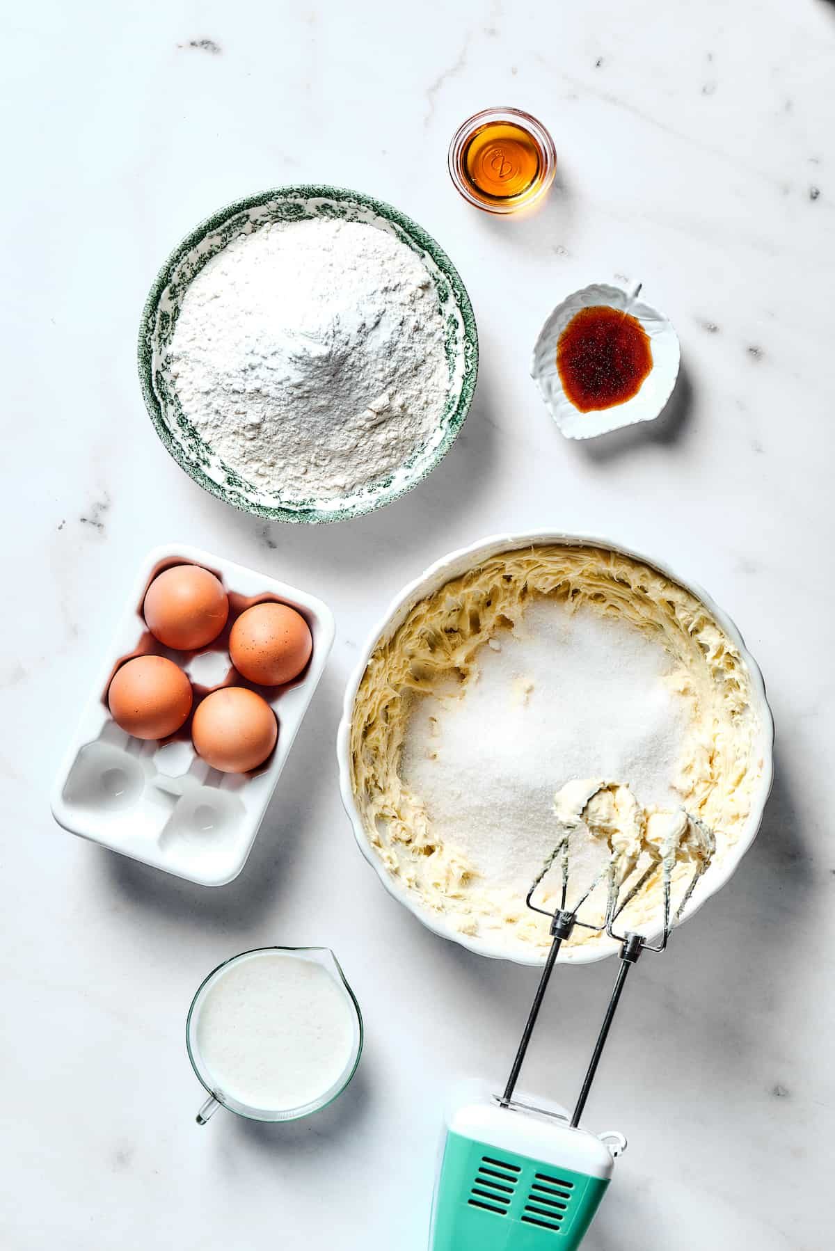 Creaming butter and sugar in a mixing bowl.