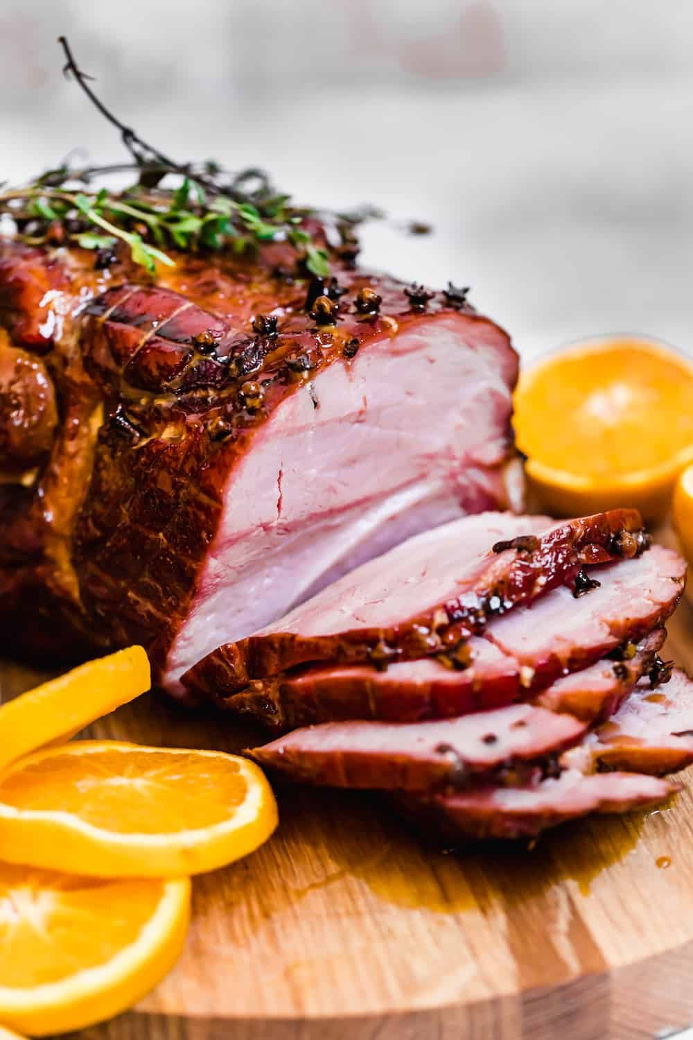 A Glazed Christmas Ham with Four Slices Cut Off