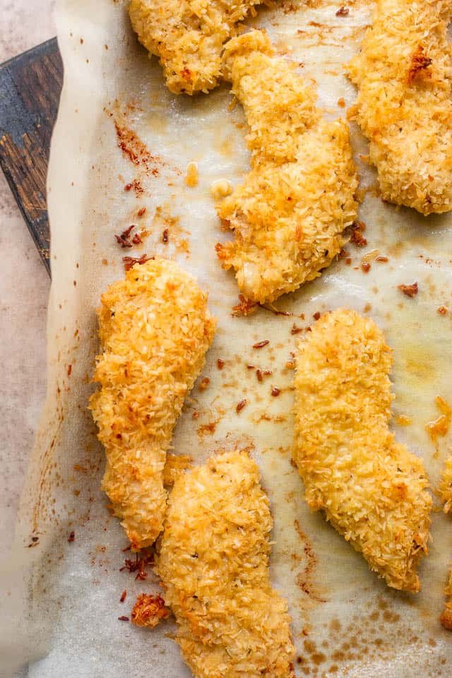 overhead shot of chicken tenders on a baking sheet