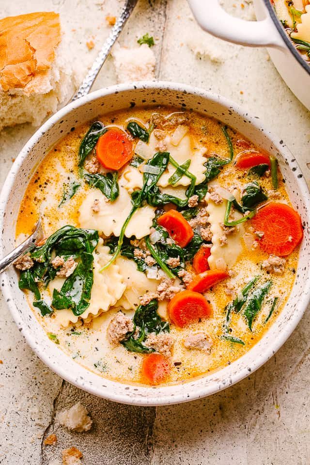 Bowl of creamy ravioli soup.