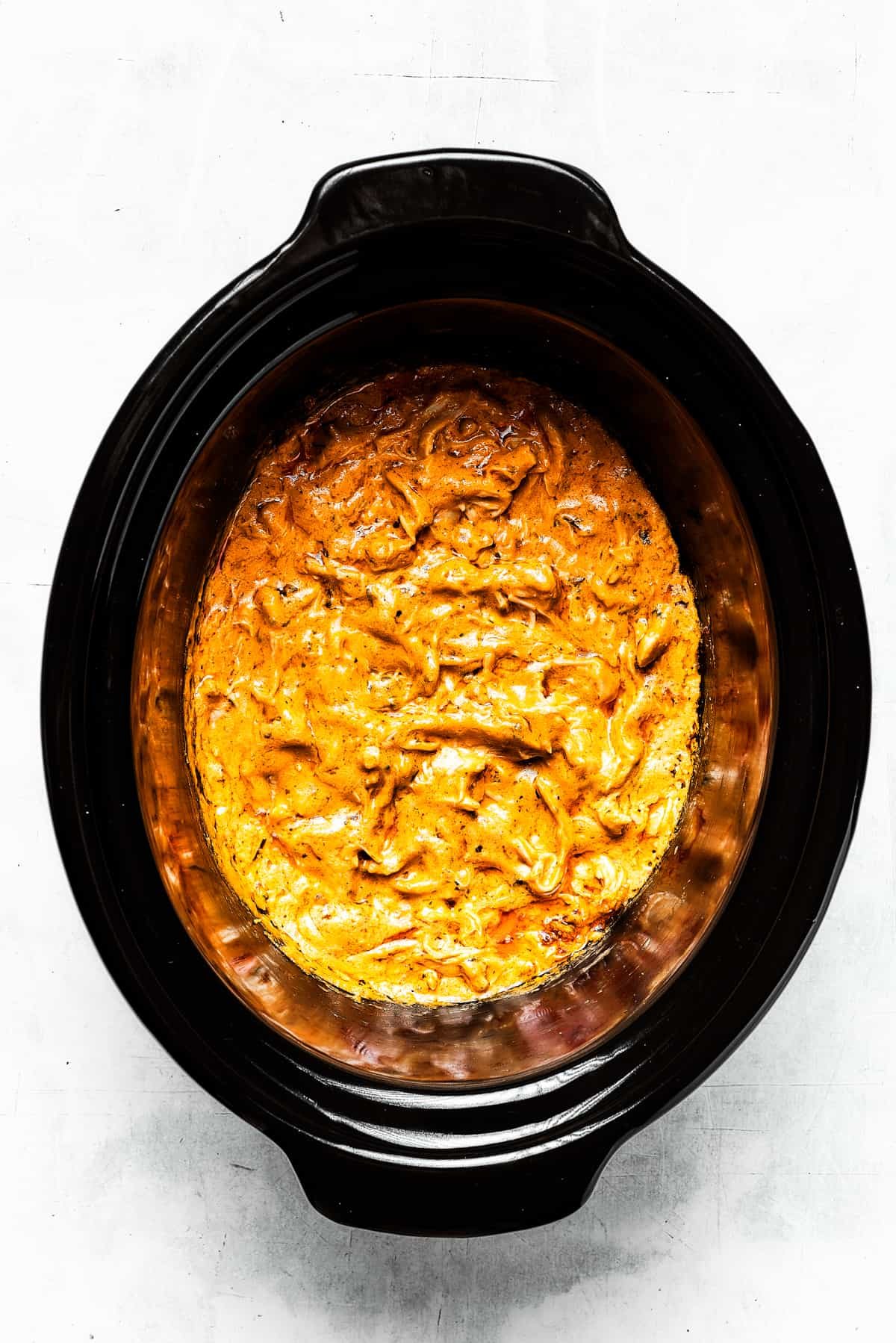 Cooked crockpot buffalo chicken dip.