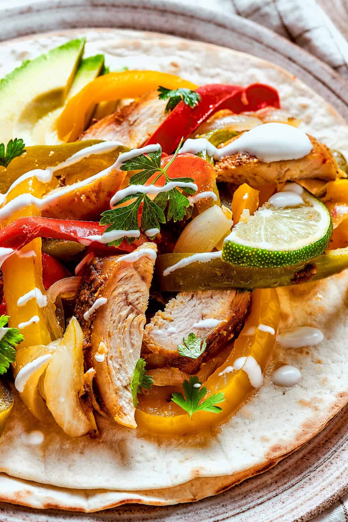 Slow cooker chicken fajitas with sour cream.