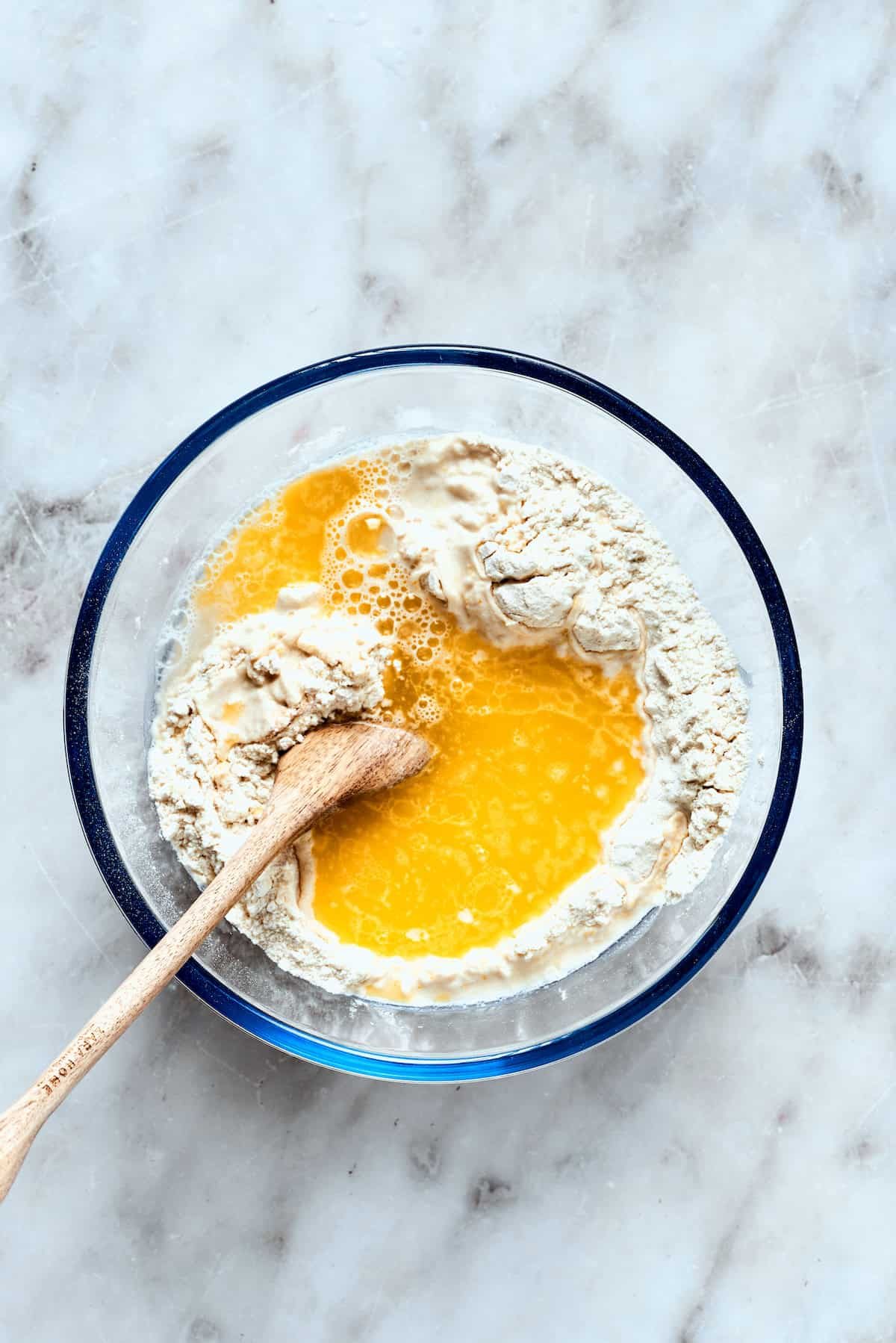 Water and olive oil are mixed in.