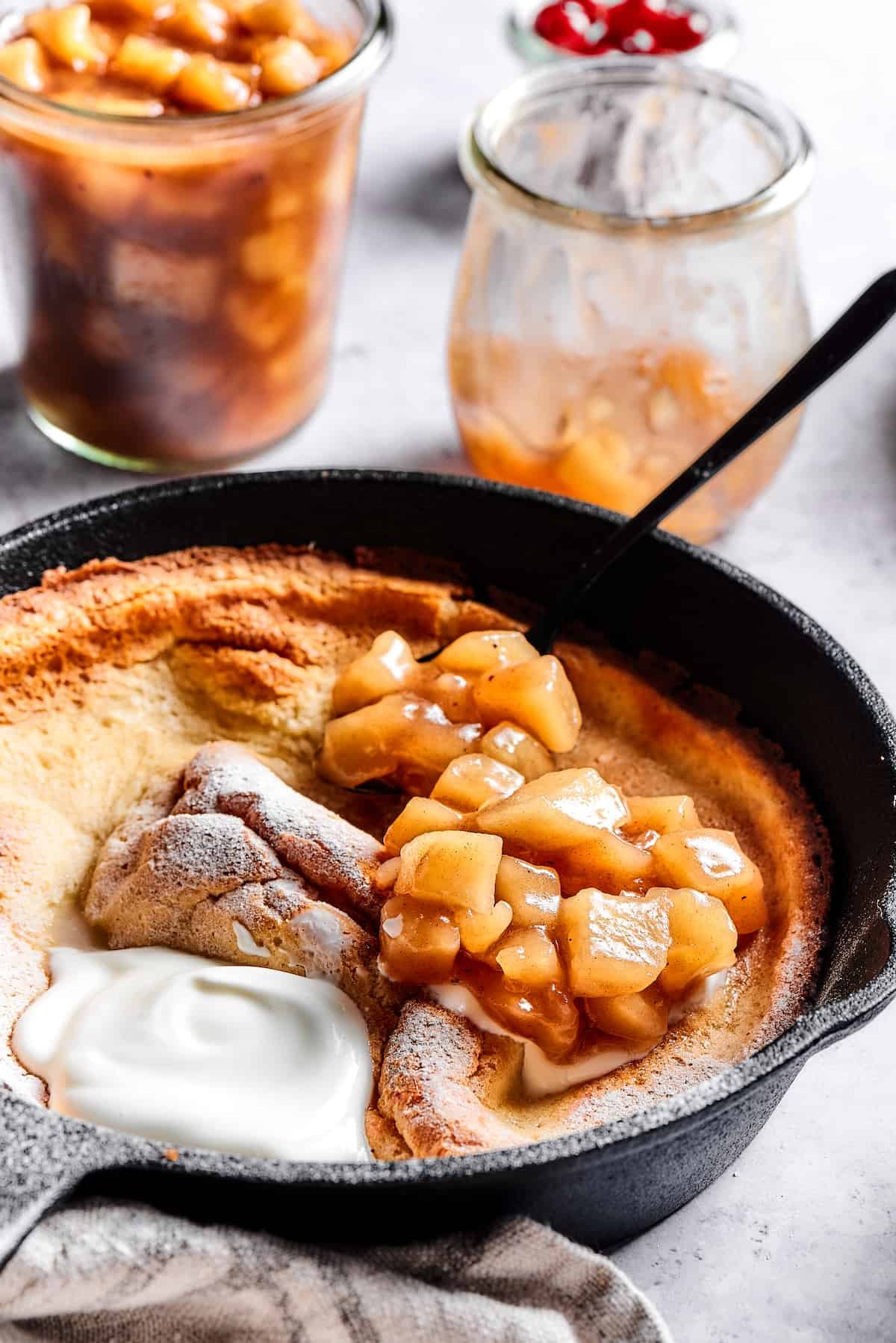 A German pancake with yogurt and apple filling.