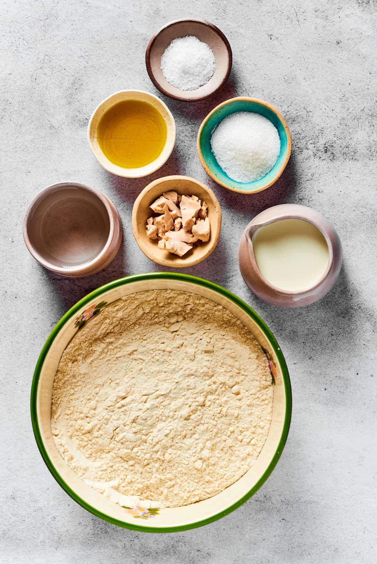From top: Salt, oil, sugar, water, yeast, milk, flour.