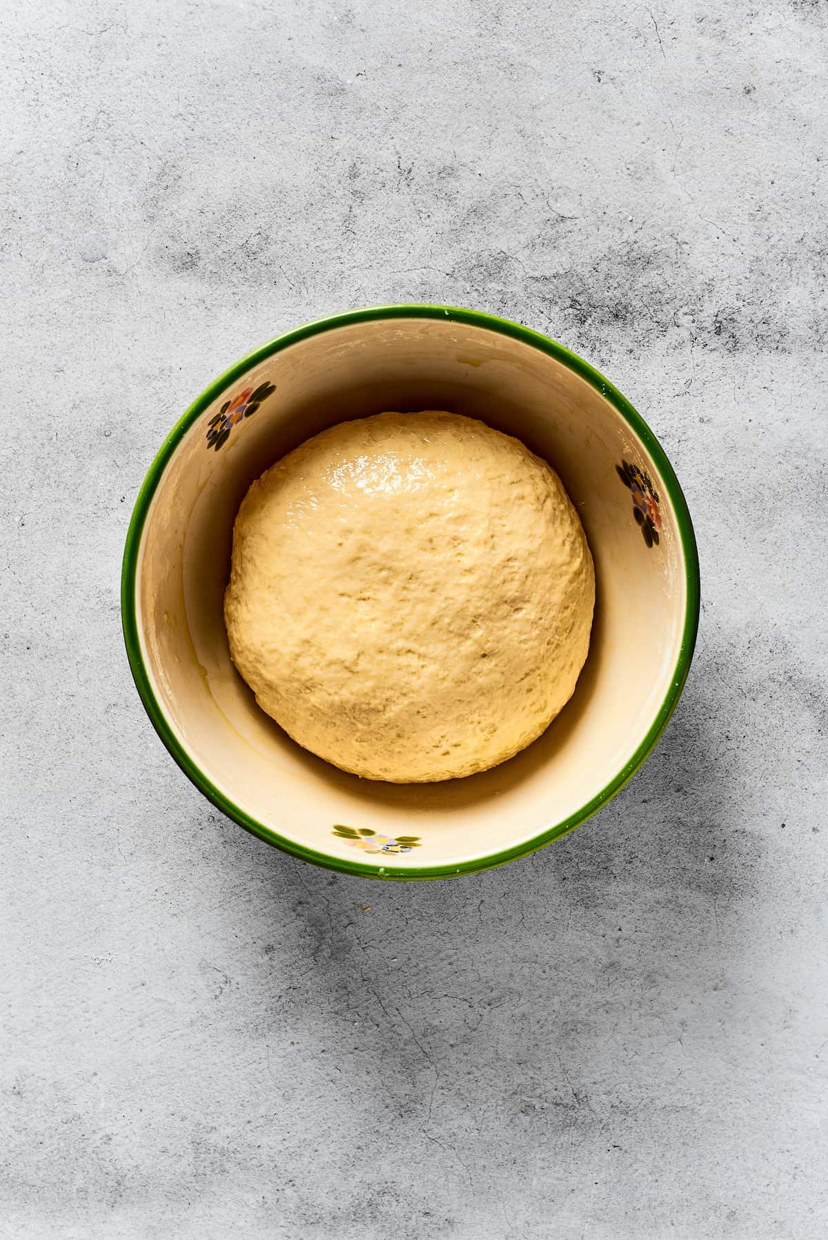 A small ball of dough in a mixing bowl.