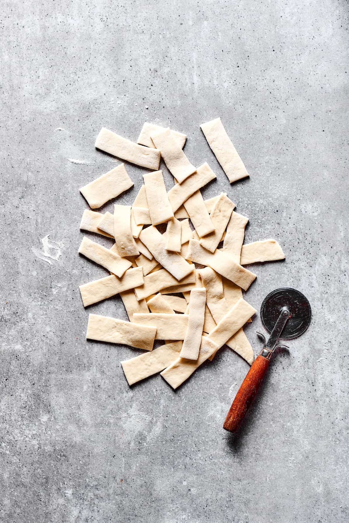 Dough cut into small rectangular strips.
