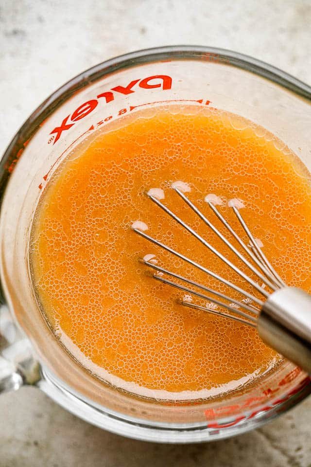 whisking chicken stir fry sauce