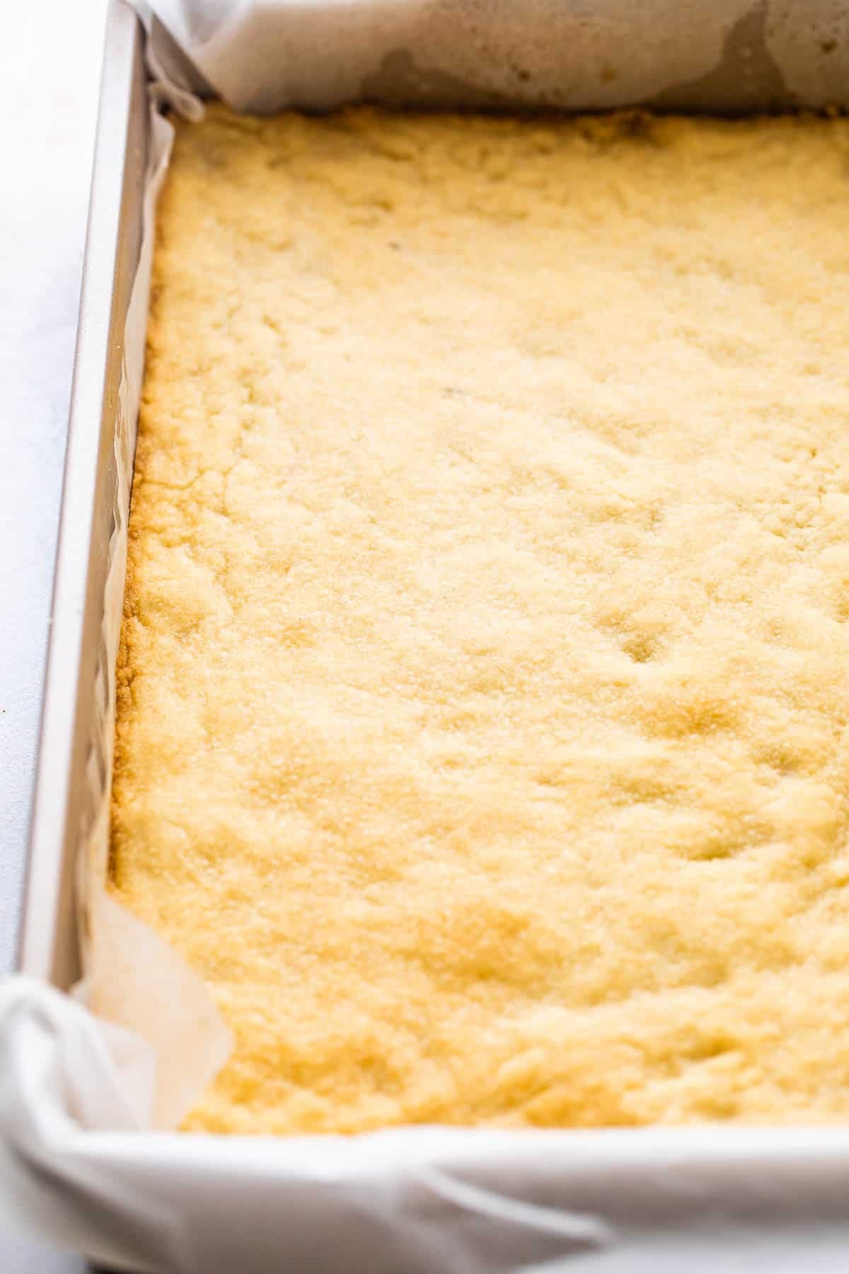 baked shortbread crust in a baking pan