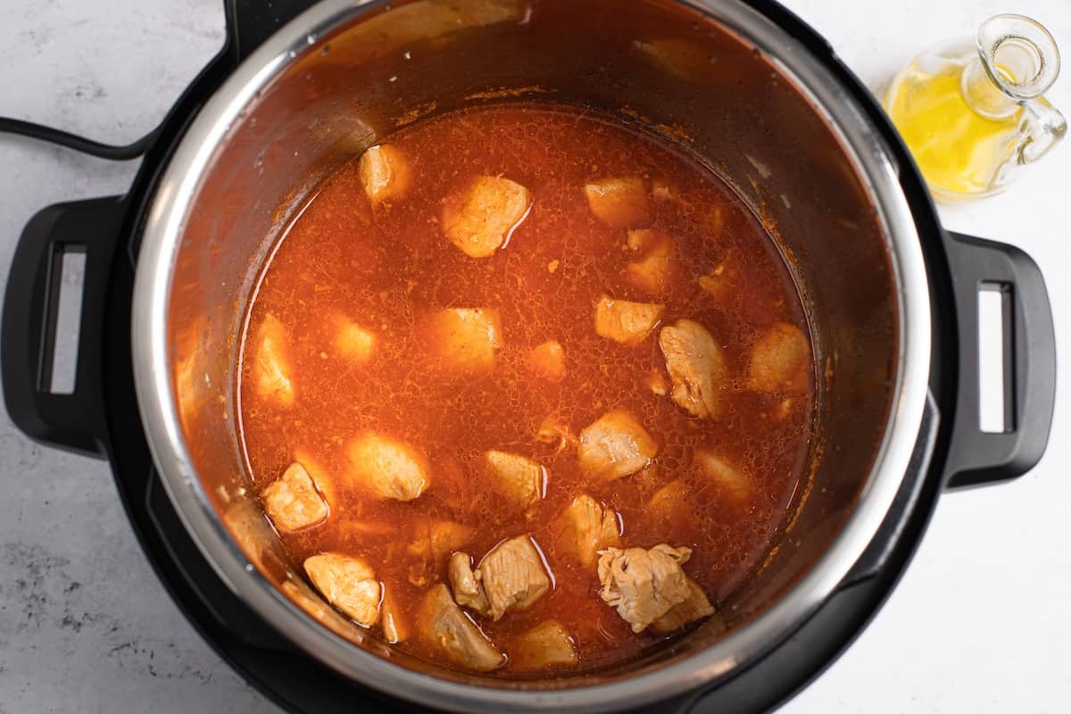 Cooked chicken and orange sauce