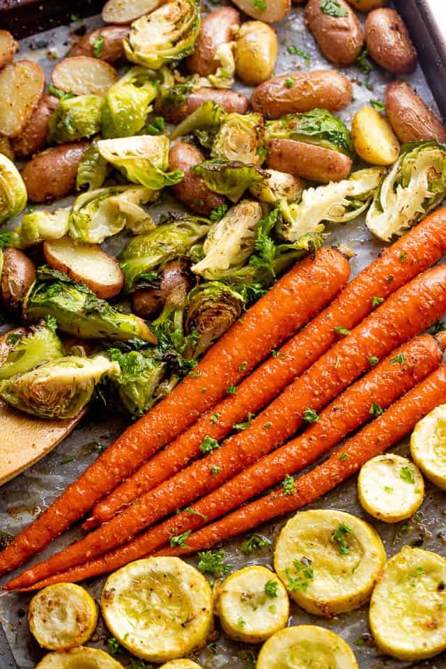 overhead shot of roasted vegetables on a baking sheet