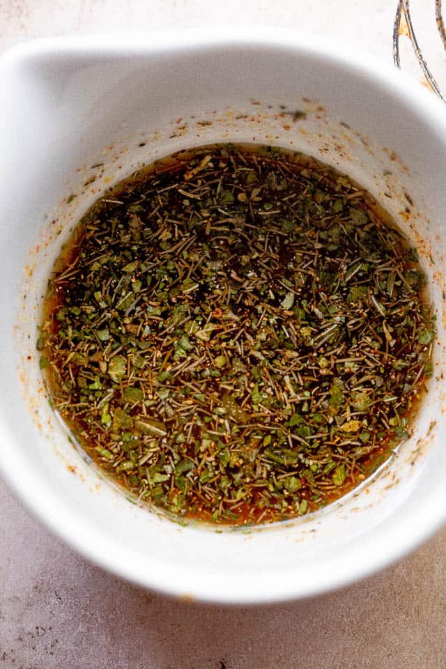 Overhead shot of balsamic vinaigrette in a small white bowl