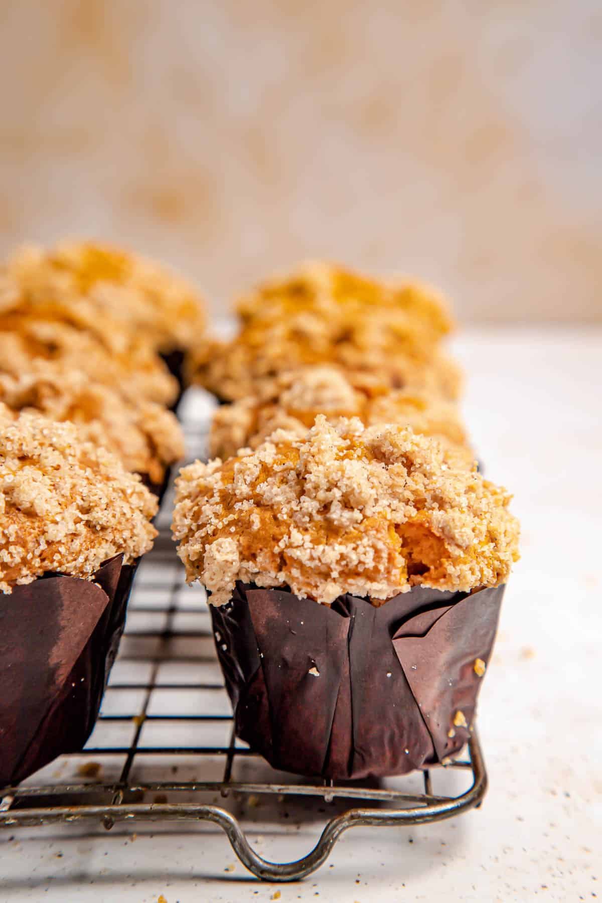 pumpkin muffins cooling on a wire rack