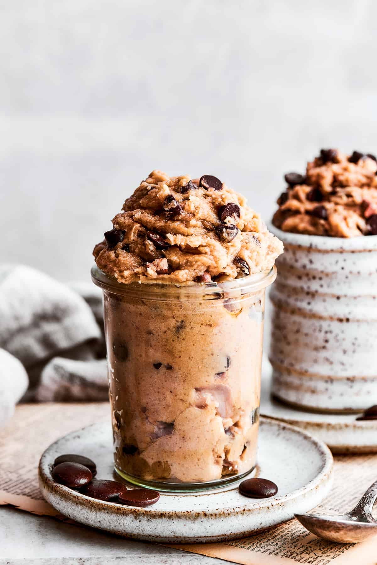 Edible cookie dough placed inside two jars.