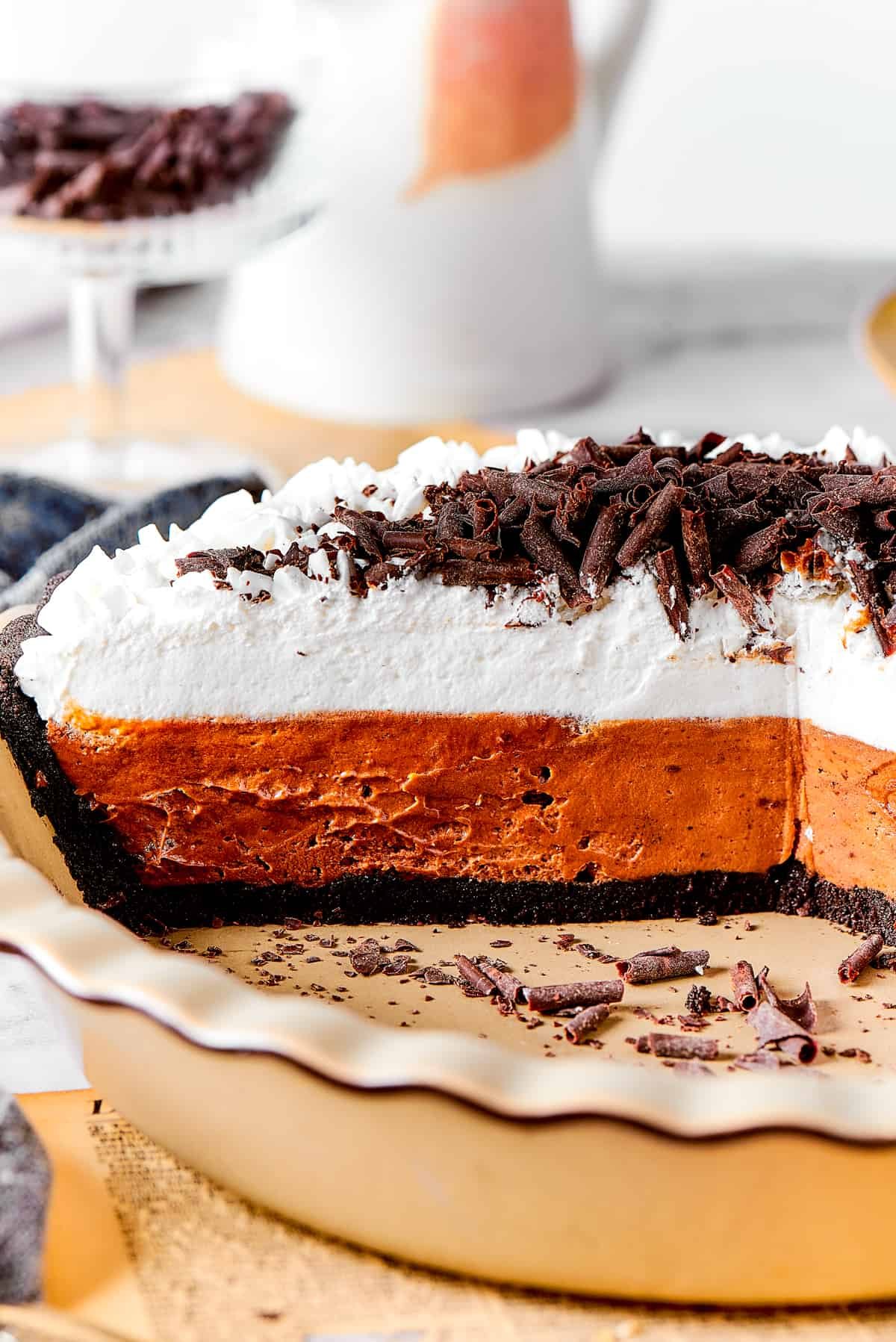 Pie in a plate with a layer of chocolate and a top layer of vanilla.