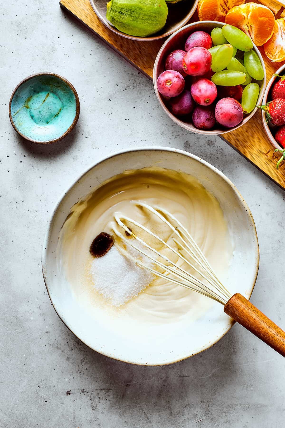 Whipping cream with sugar and vanilla.