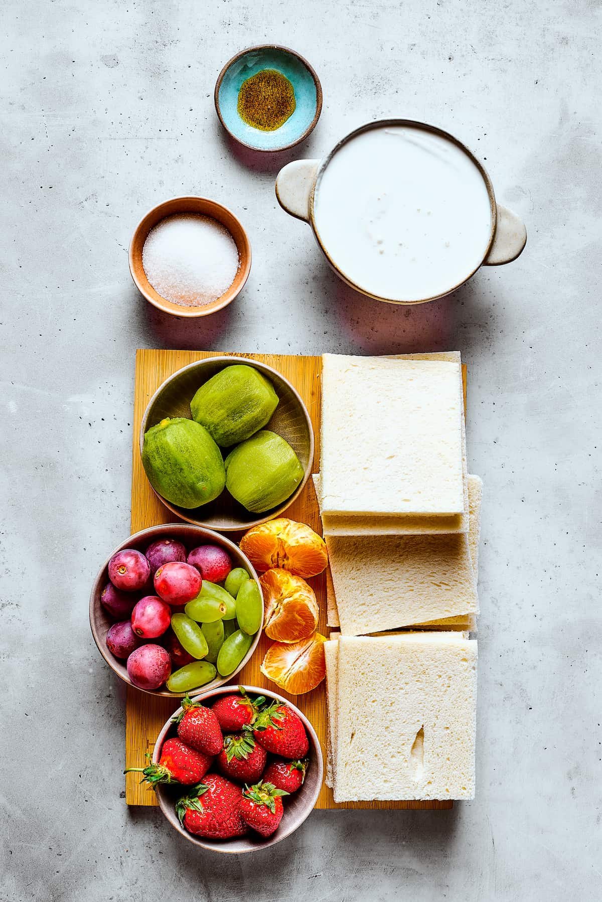 Ingredients for homemade fruit sando measured and arranged on a work surface.