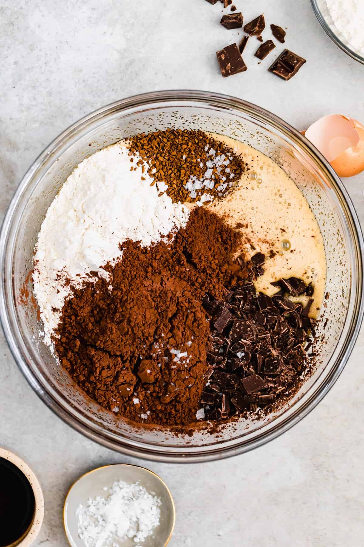 A Glass Bowl of Brownie Batter with the Chocolate and Dry Ingredients Added, But Not Mixed In