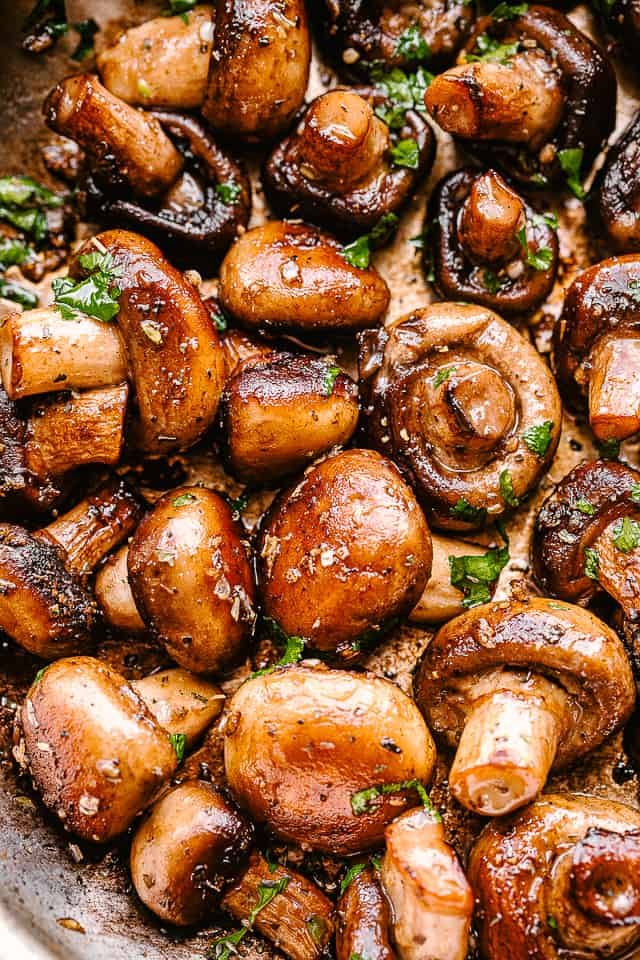 Close up of garlic button mushrooms.