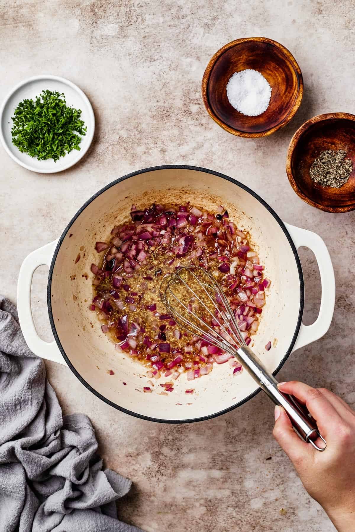Red onion and garlic in a pot.