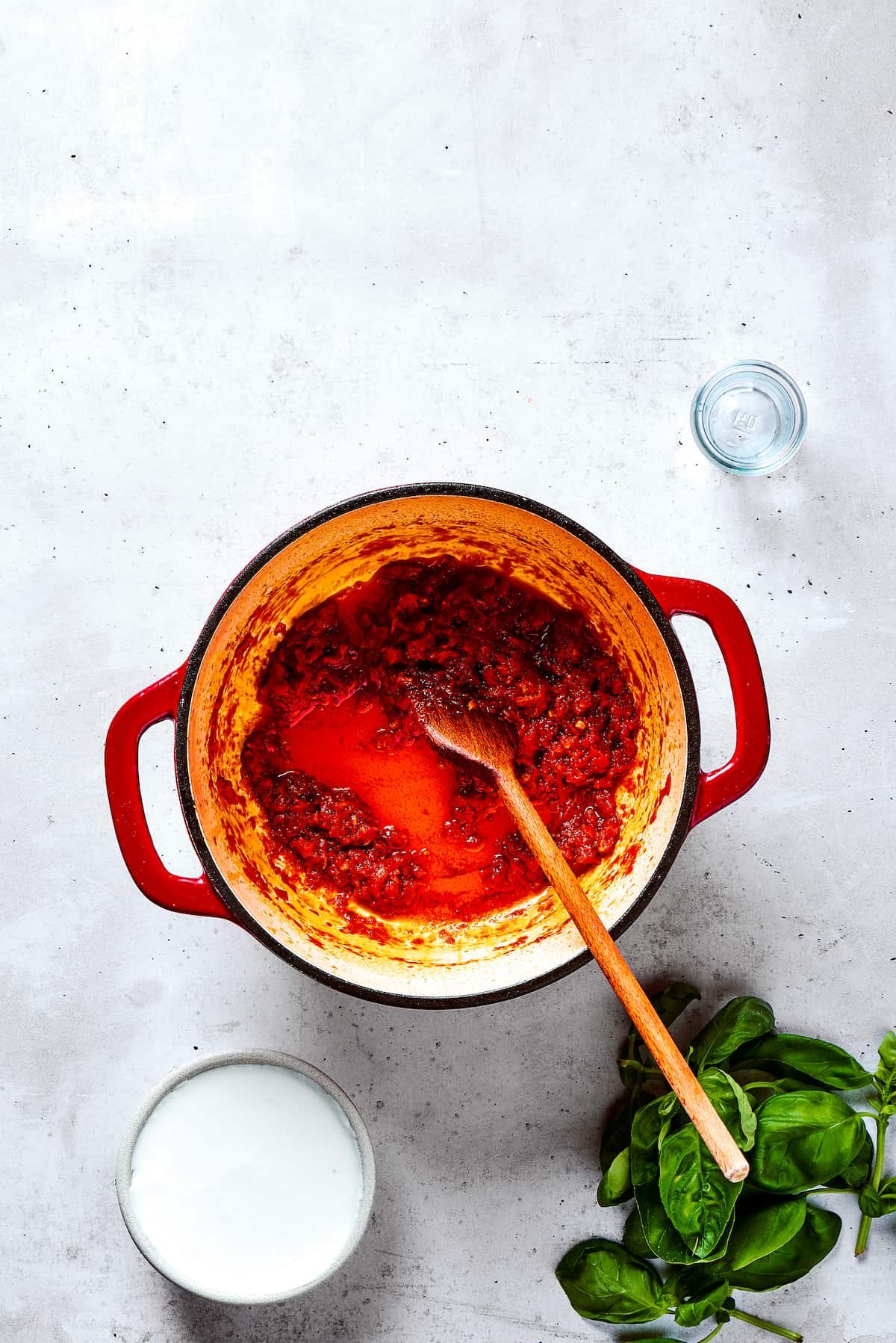 Adding seasonings to a pot.
